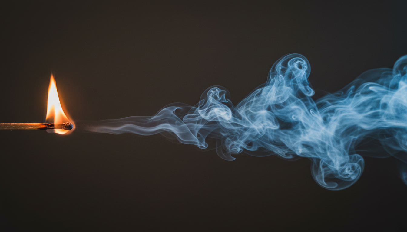photograph_a_lit_match_burning_on_the_left_side_transitioni